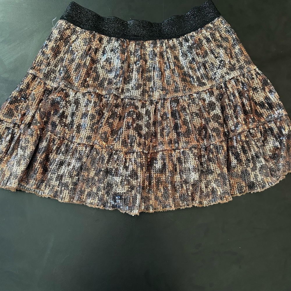Leopard sequin short mini skirt with lining. Size 10 with zipper back beautiful